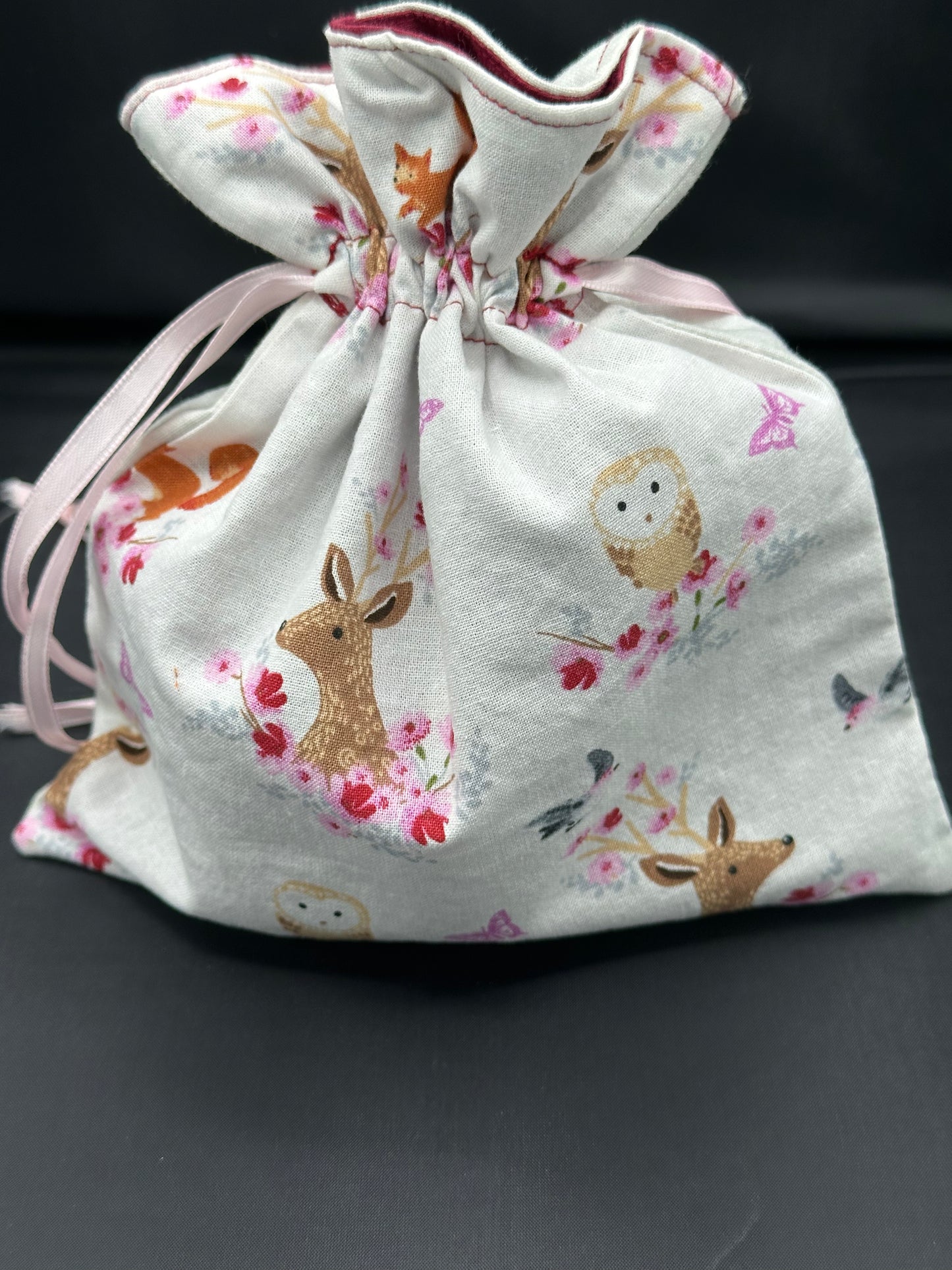 Embroidered butterfly draw string bag