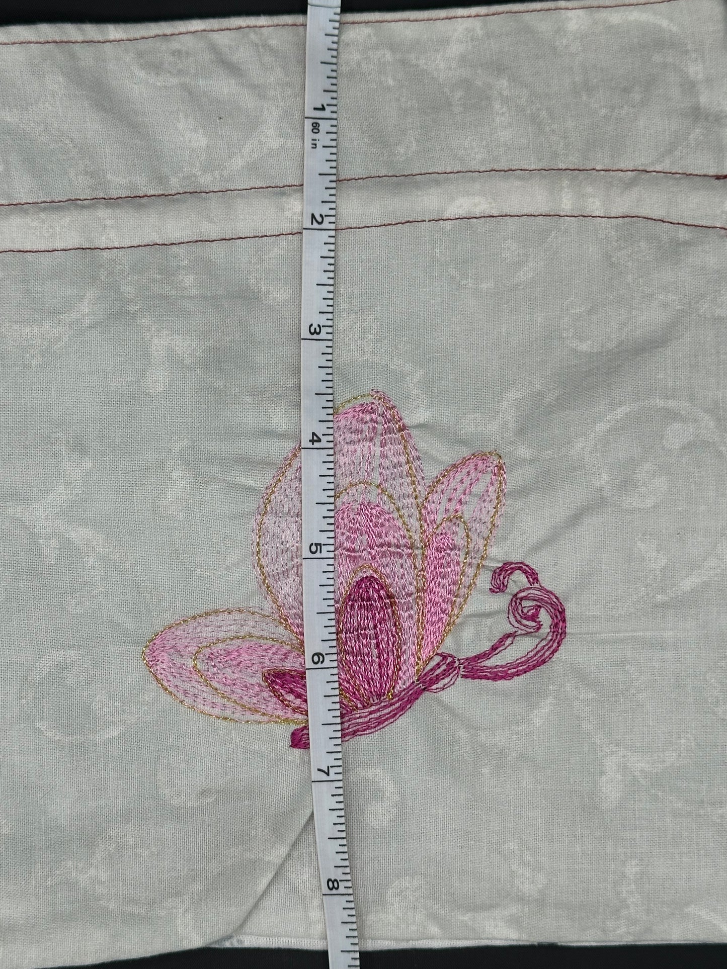Embroidered butterfly draw string bag