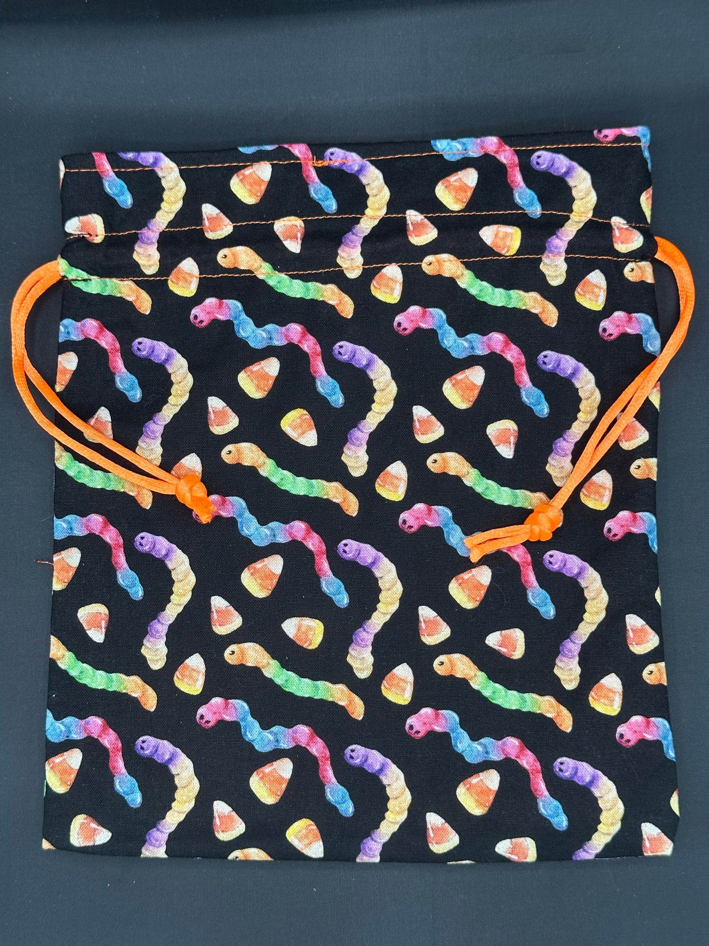 Neon gummy worms draw string bag
