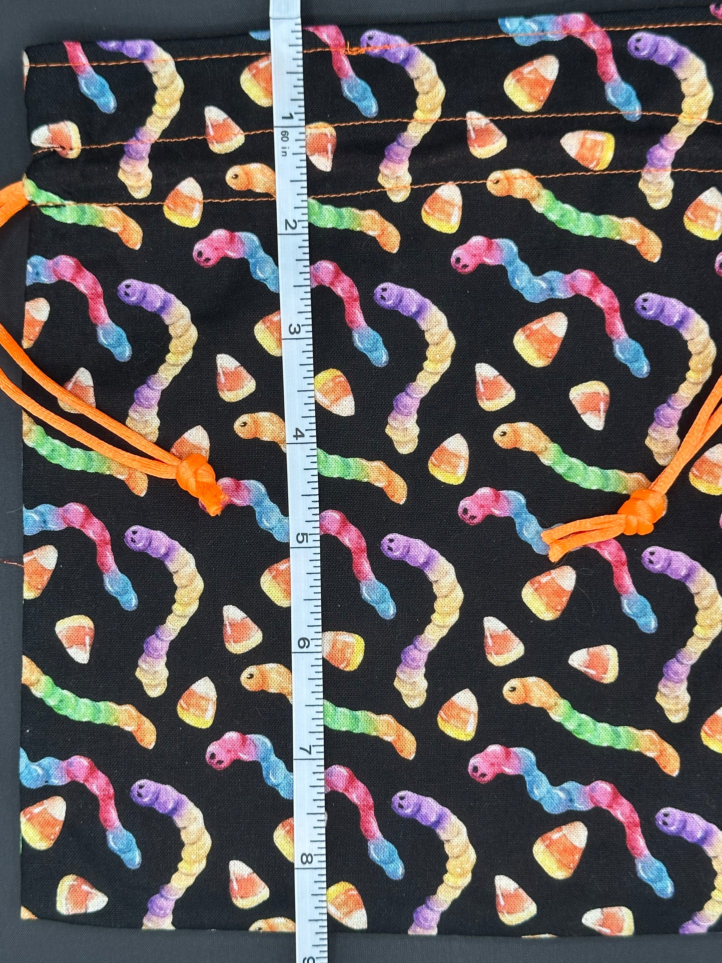 Neon gummy worms draw string bag