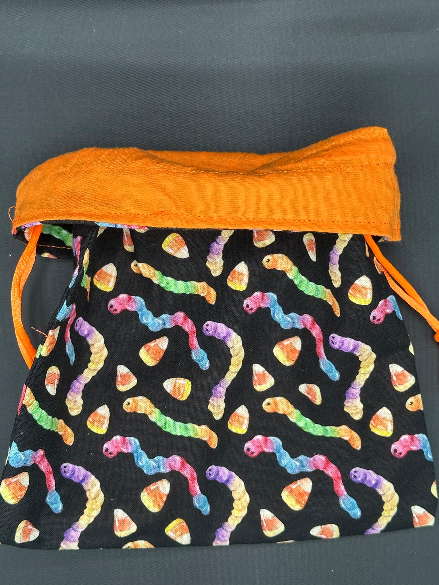 Neon gummy worms draw string bag