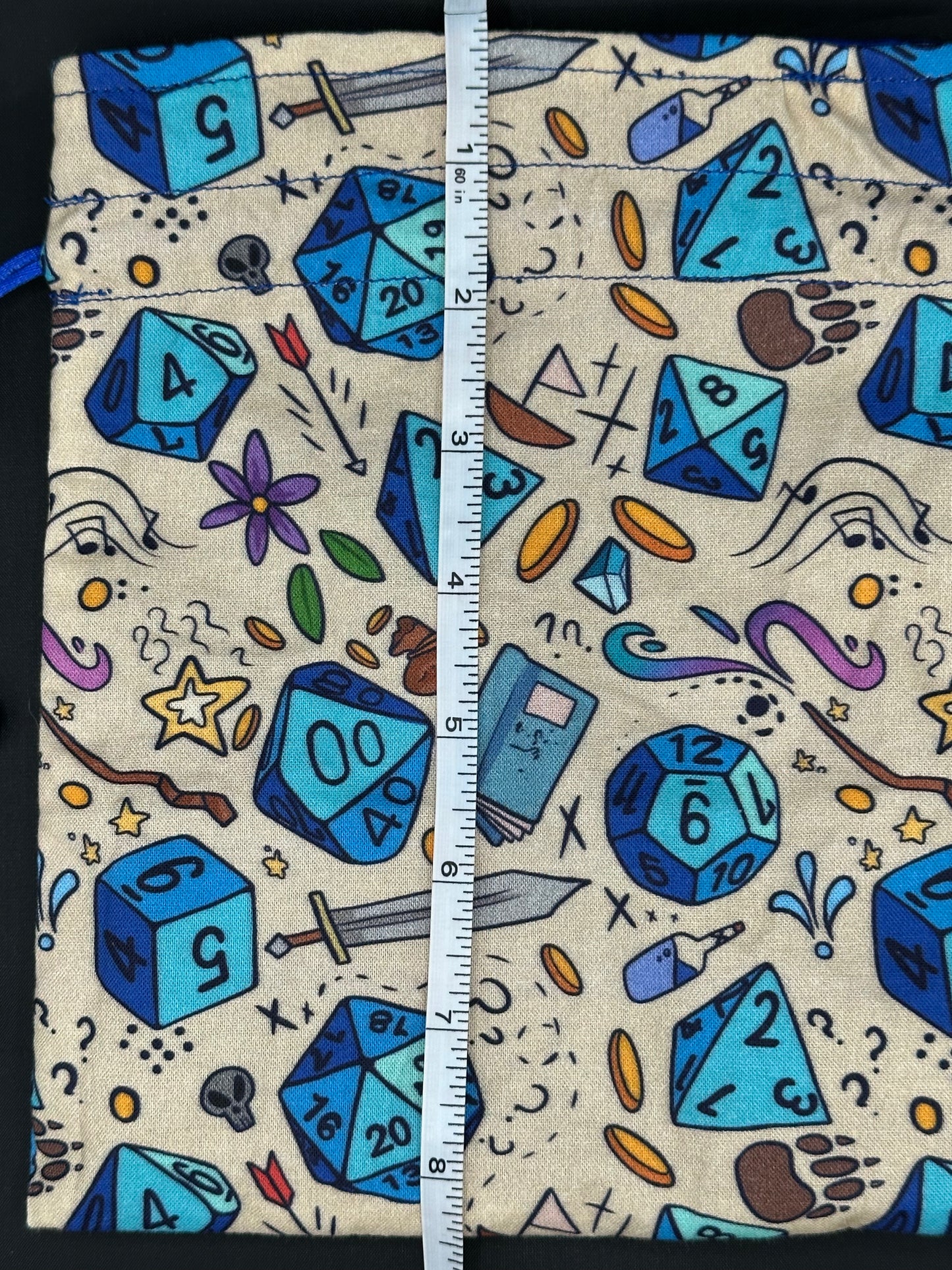 D&D Dice on tan draw string bag