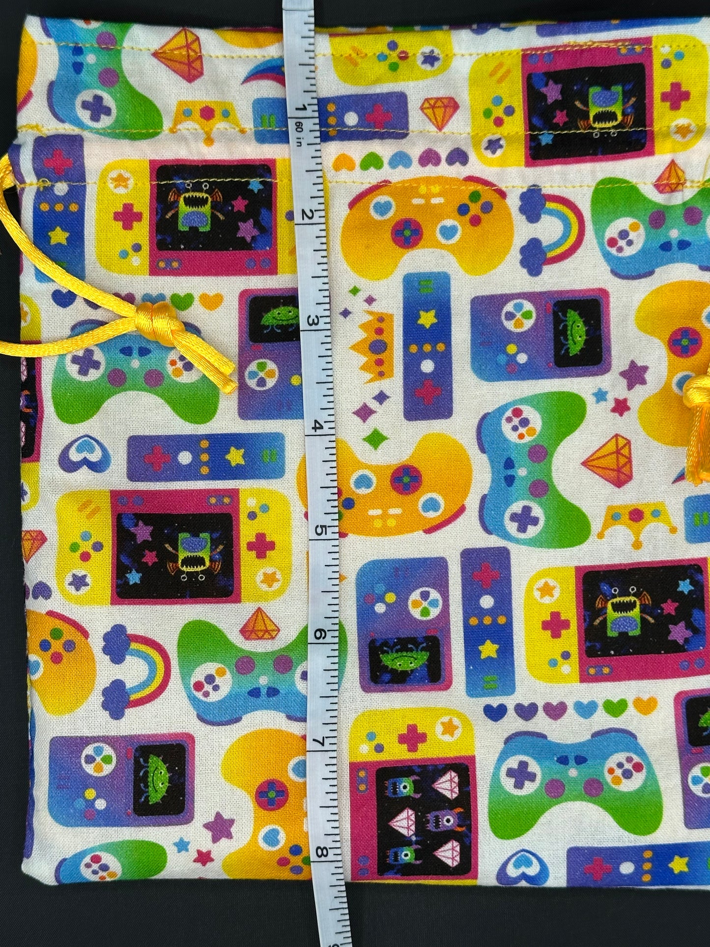 Colorful game controllers draw string bag