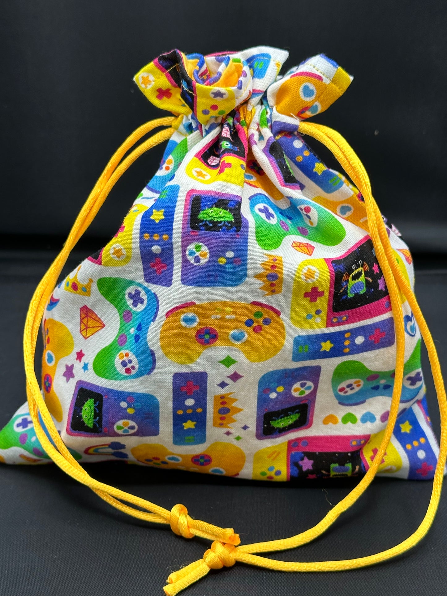Colorful game controllers draw string bag
