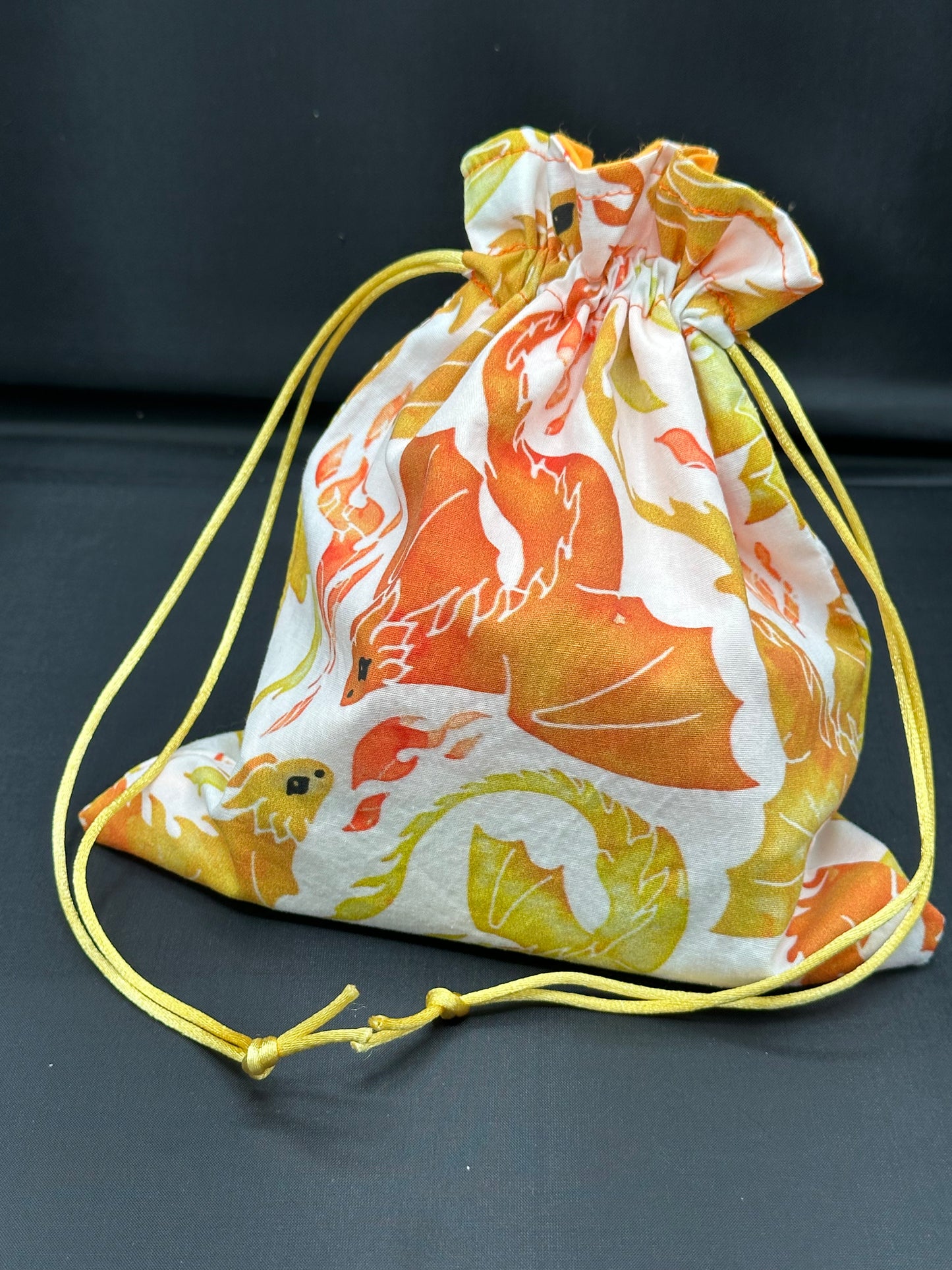 dragons - orange and yellow drawstring