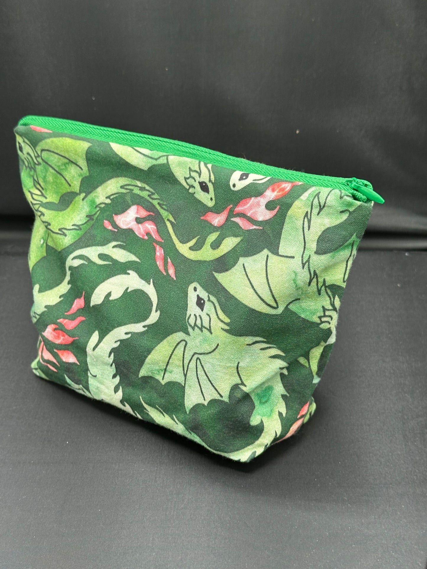 green dragons on dark green background