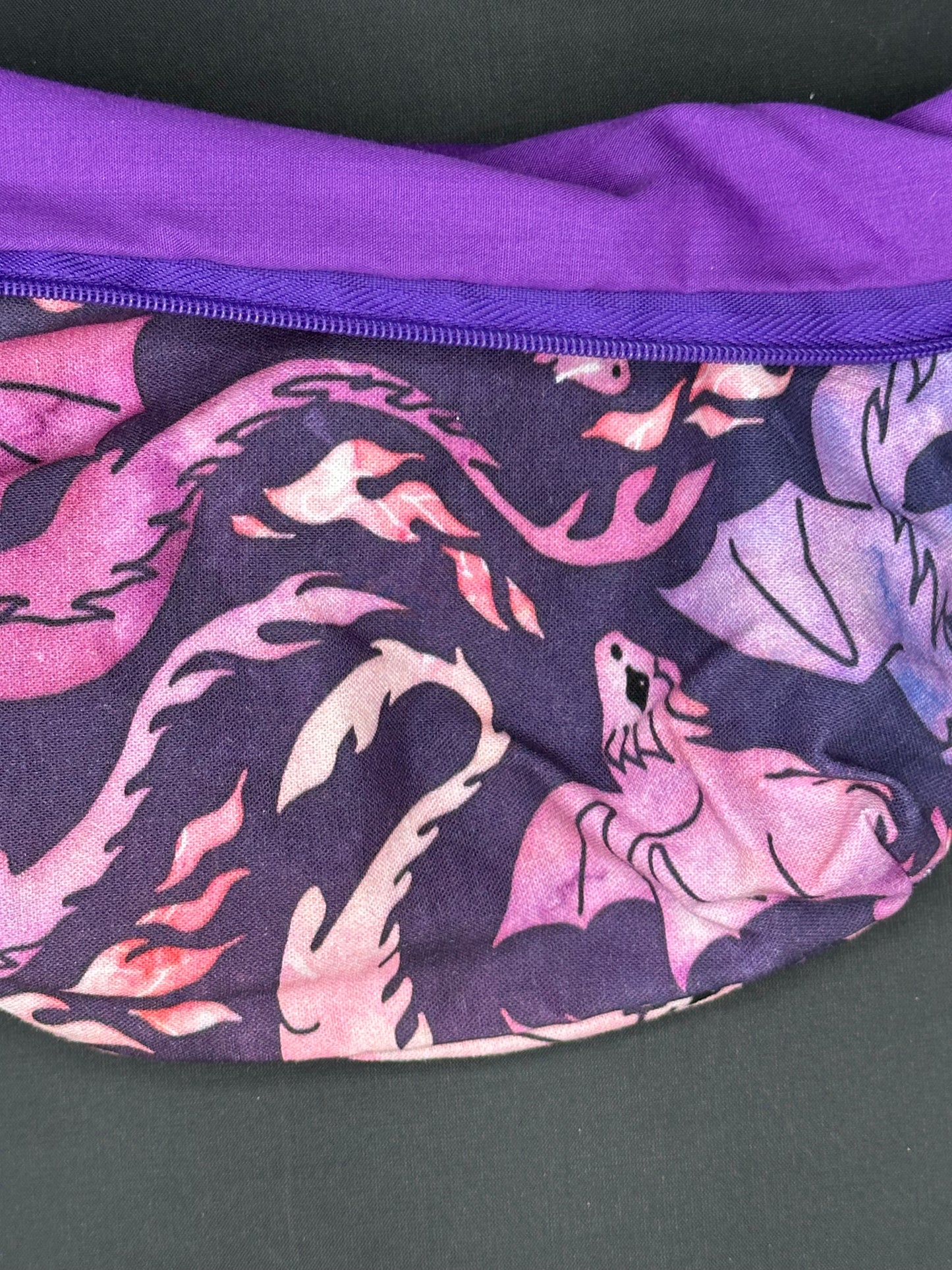 purple dragons on dark purple background