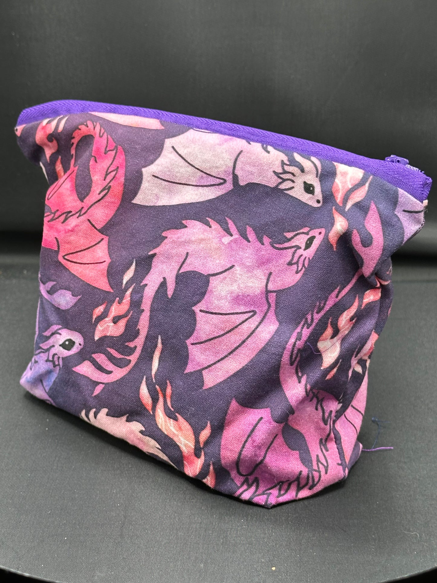 purple dragons on dark purple background