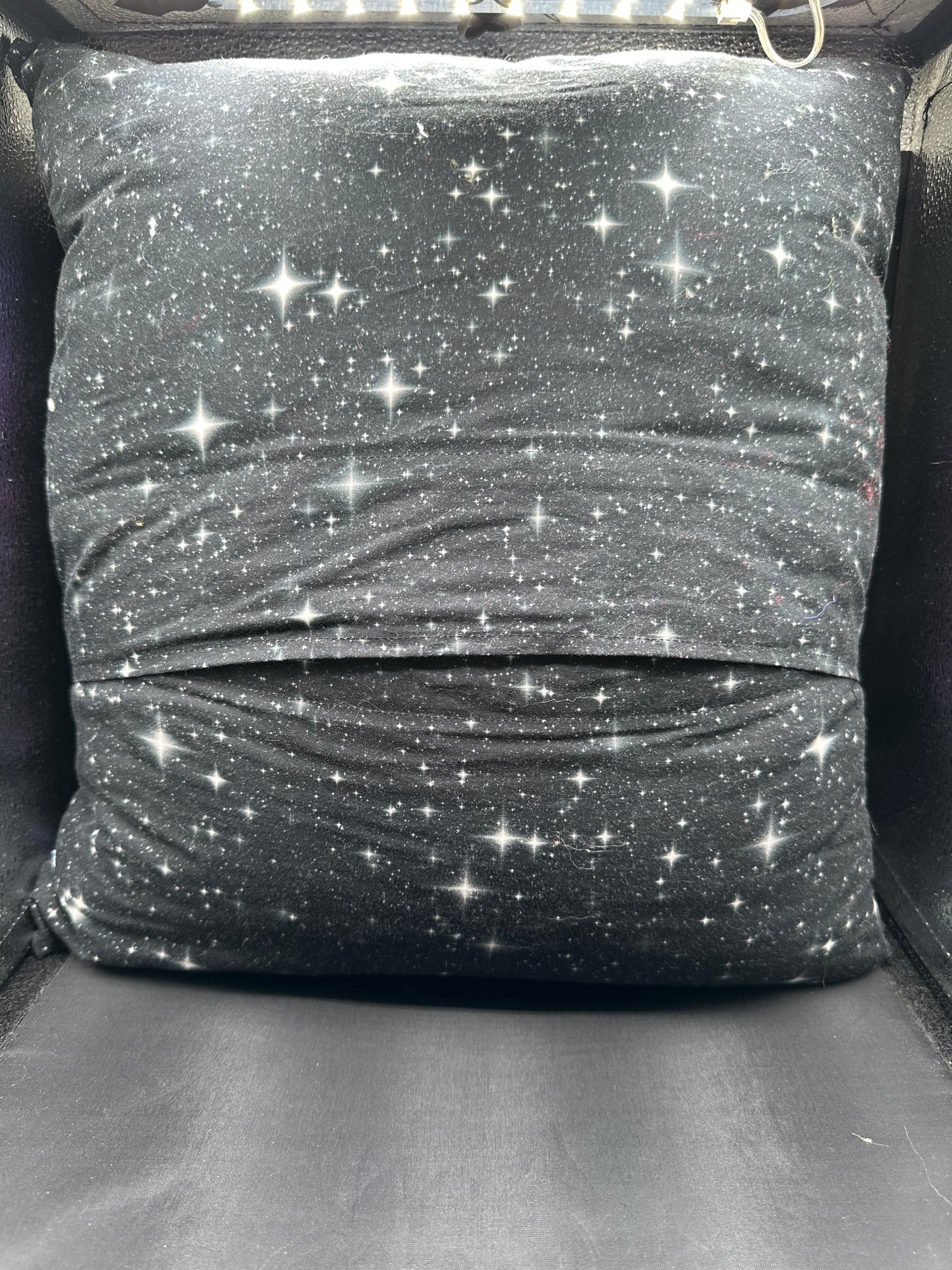 Space and ship in purple pillow