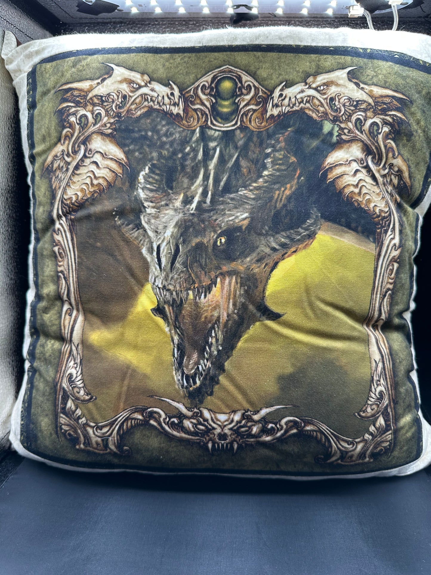 dragon head pillow in browns and cream