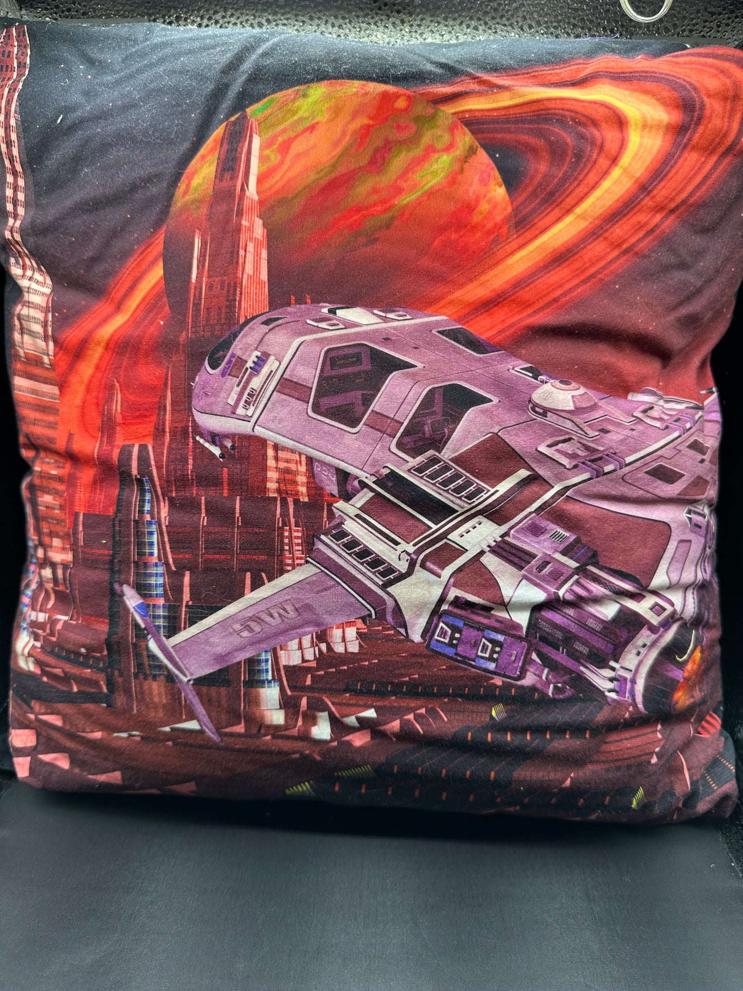 Space and ship in red pillow
