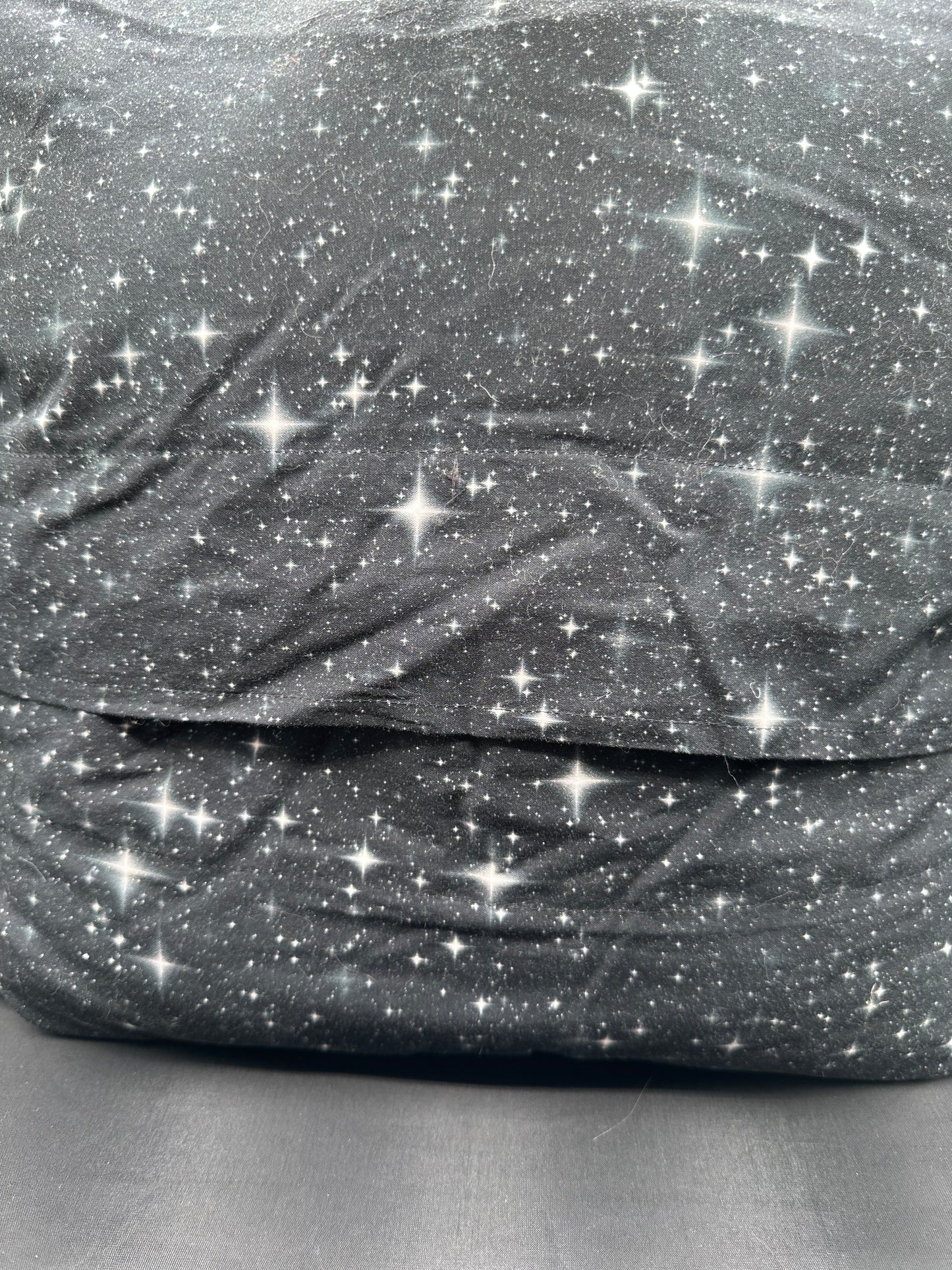 Space and ship in red pillow