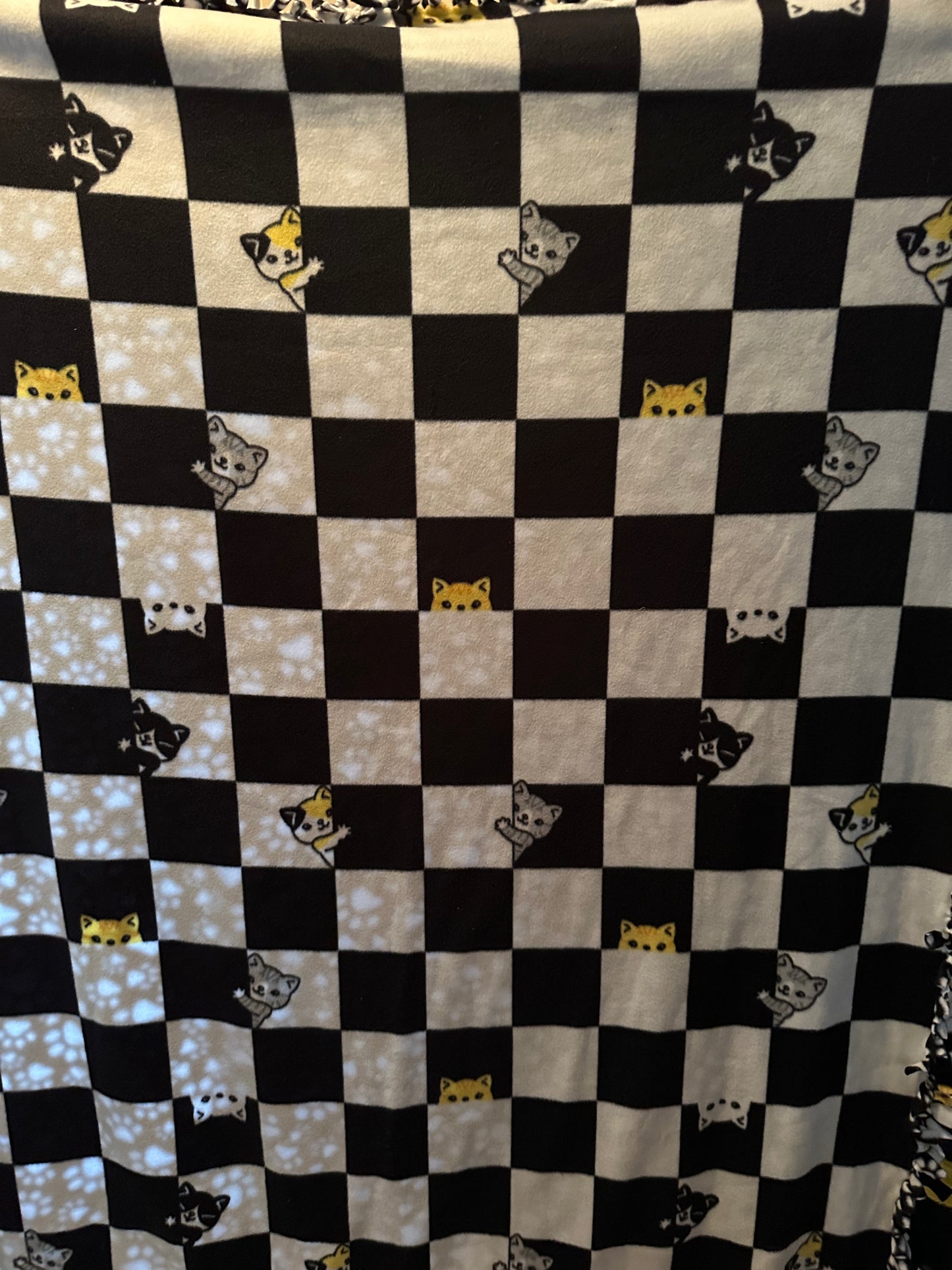 cats around black & white squares fleece blanket