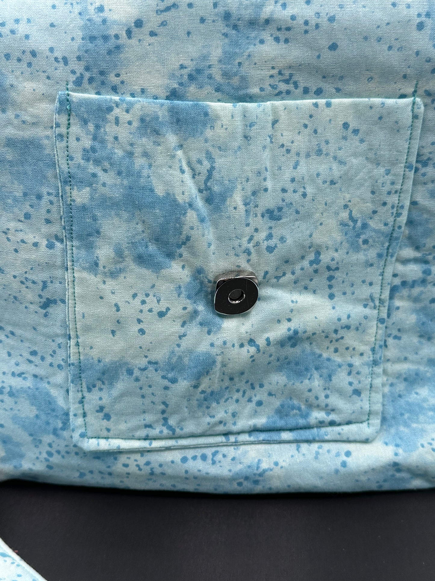 aqua speckle 12 inch messenger bag