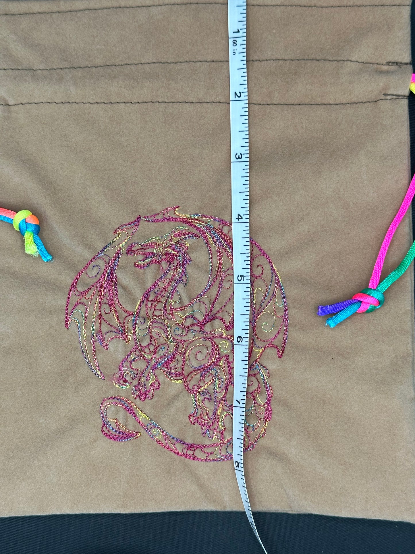 Embroidered doodle dragon draw string bag