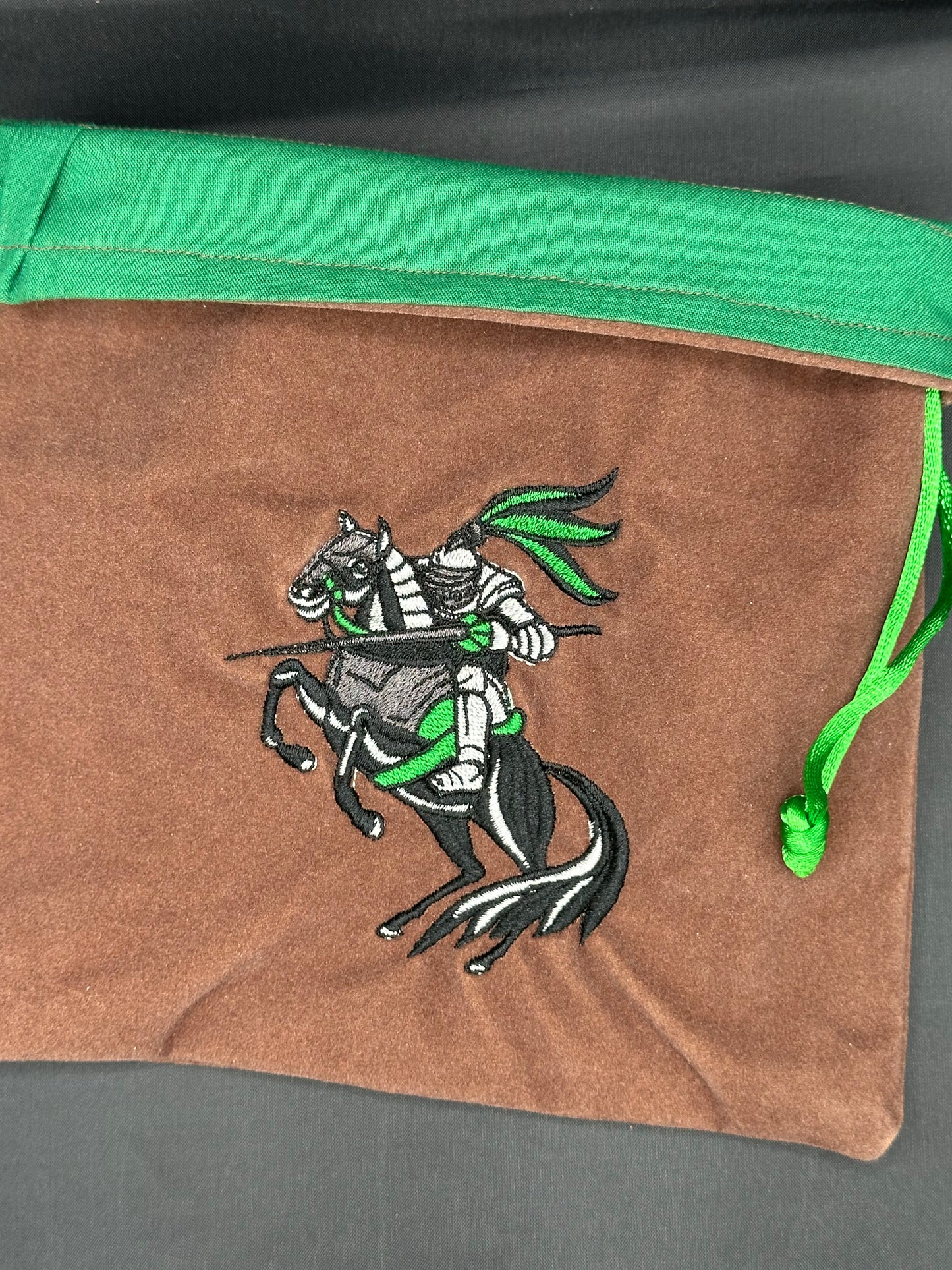Embroidered Green Jousting Knight on brown suede draw string bag