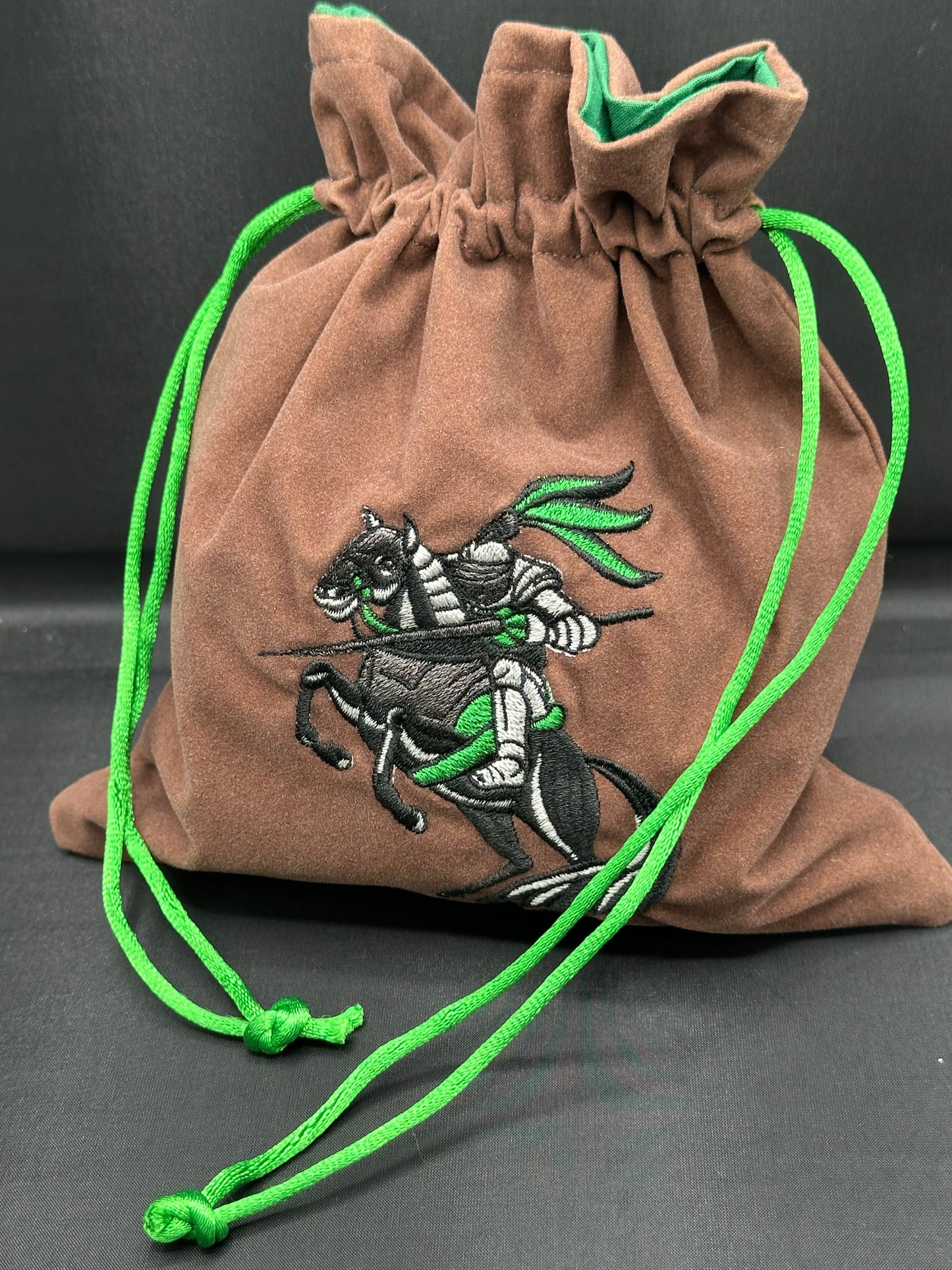 Embroidered Green Jousting Knight on brown suede draw string bag