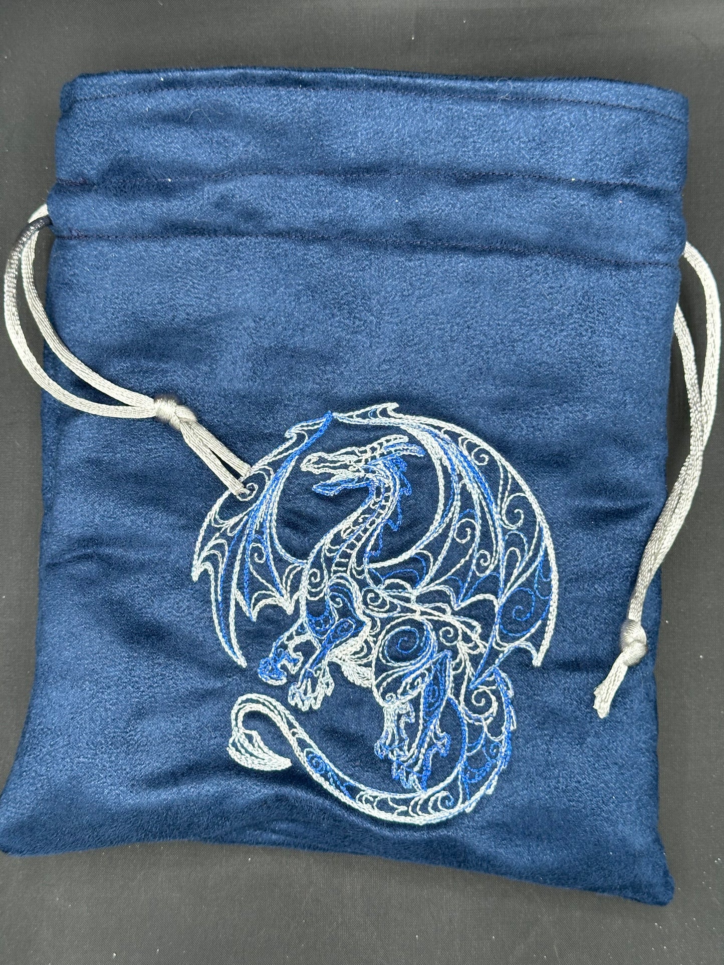 Embroidered doodle dragon draw string bag