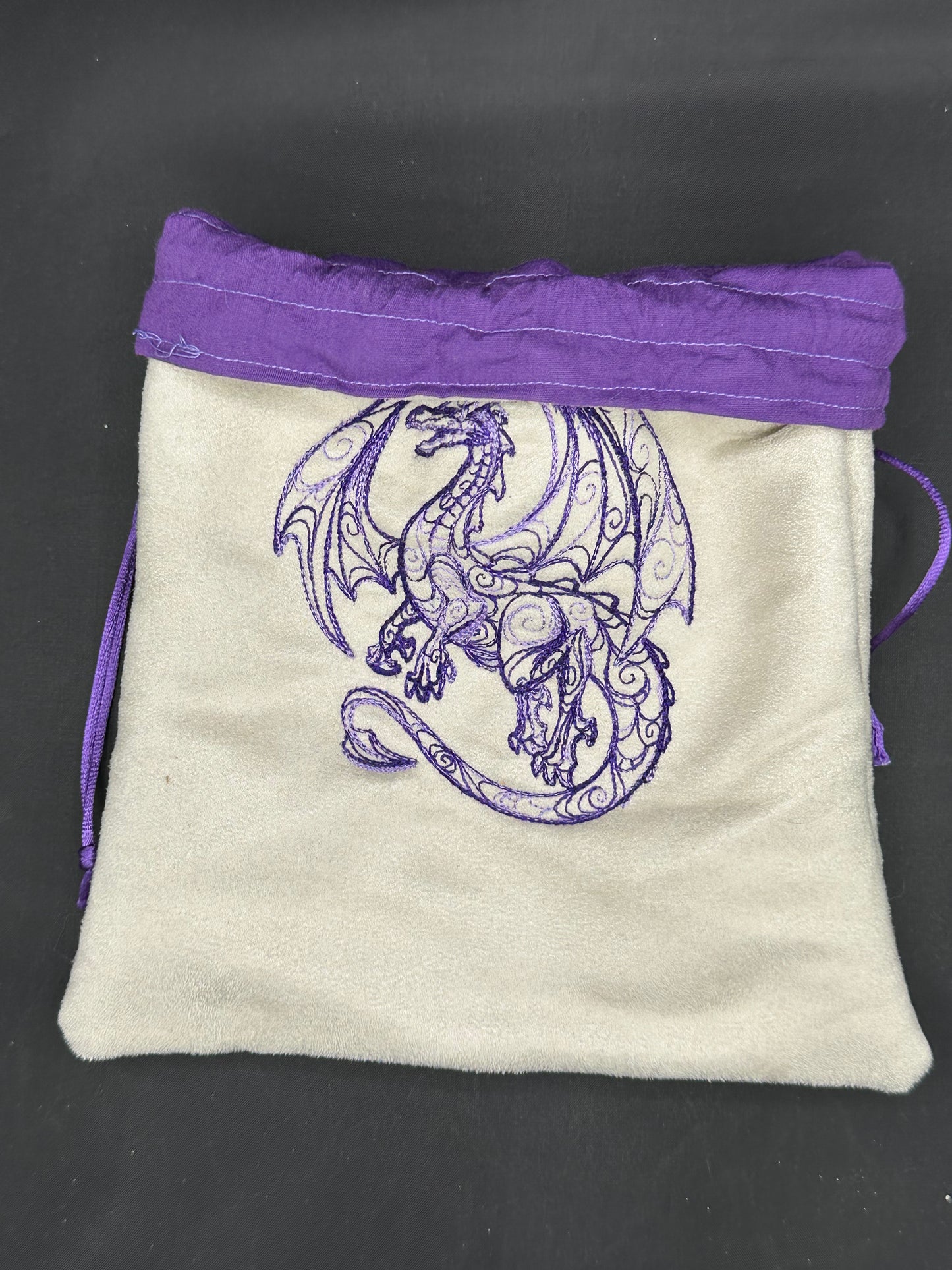 Embroidered doodle dragon draw string bag