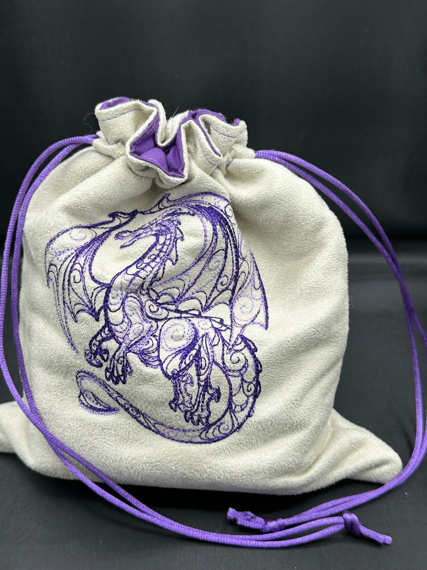 Embroidered doodle dragon draw string bag