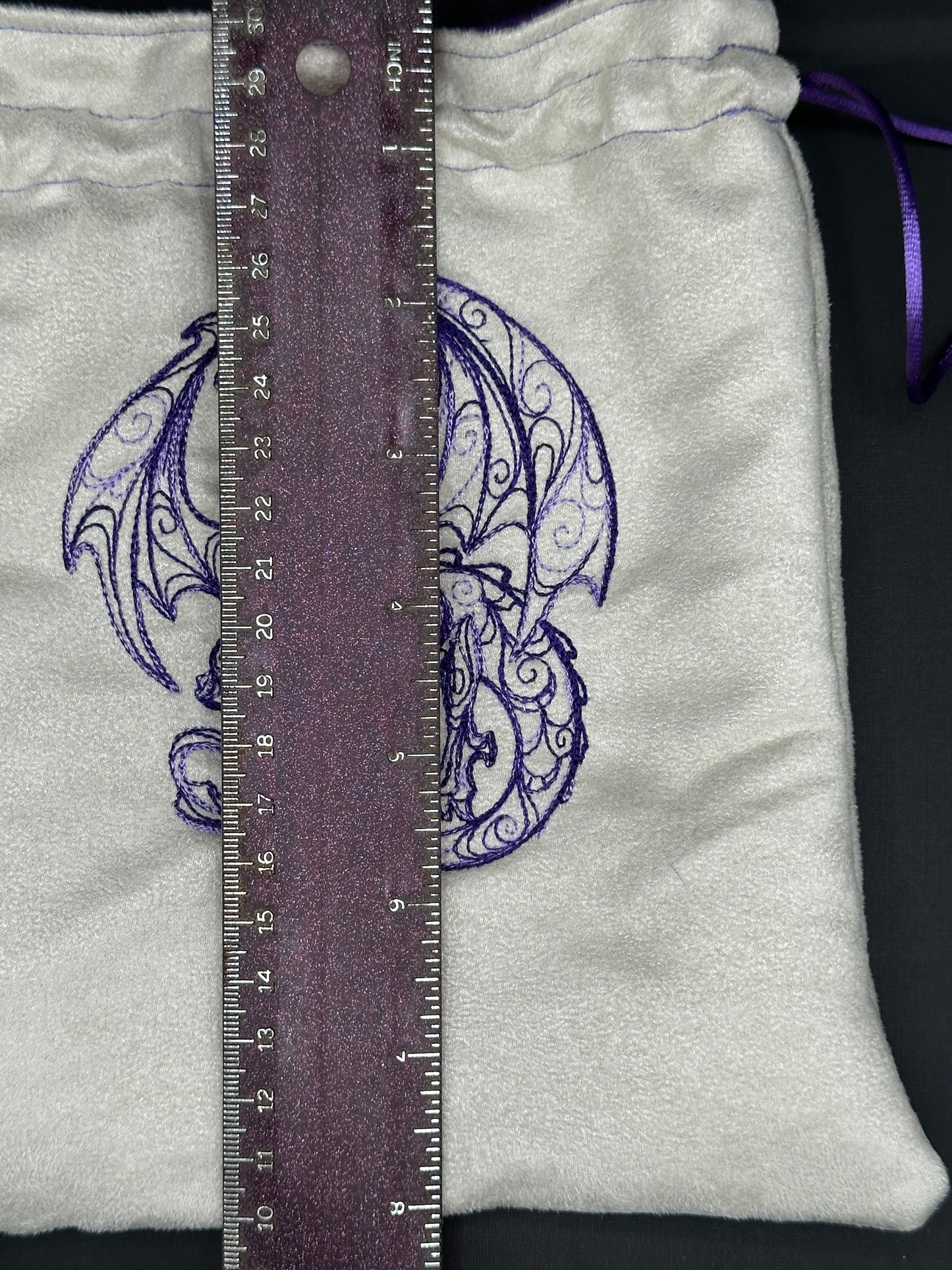 Embroidered doodle dragon draw string bag