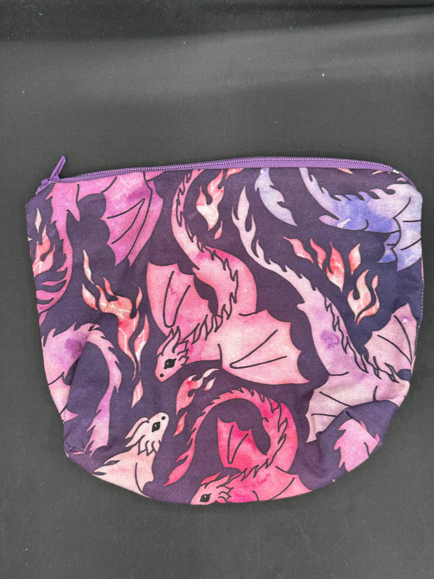 purple dragons on dark purple background