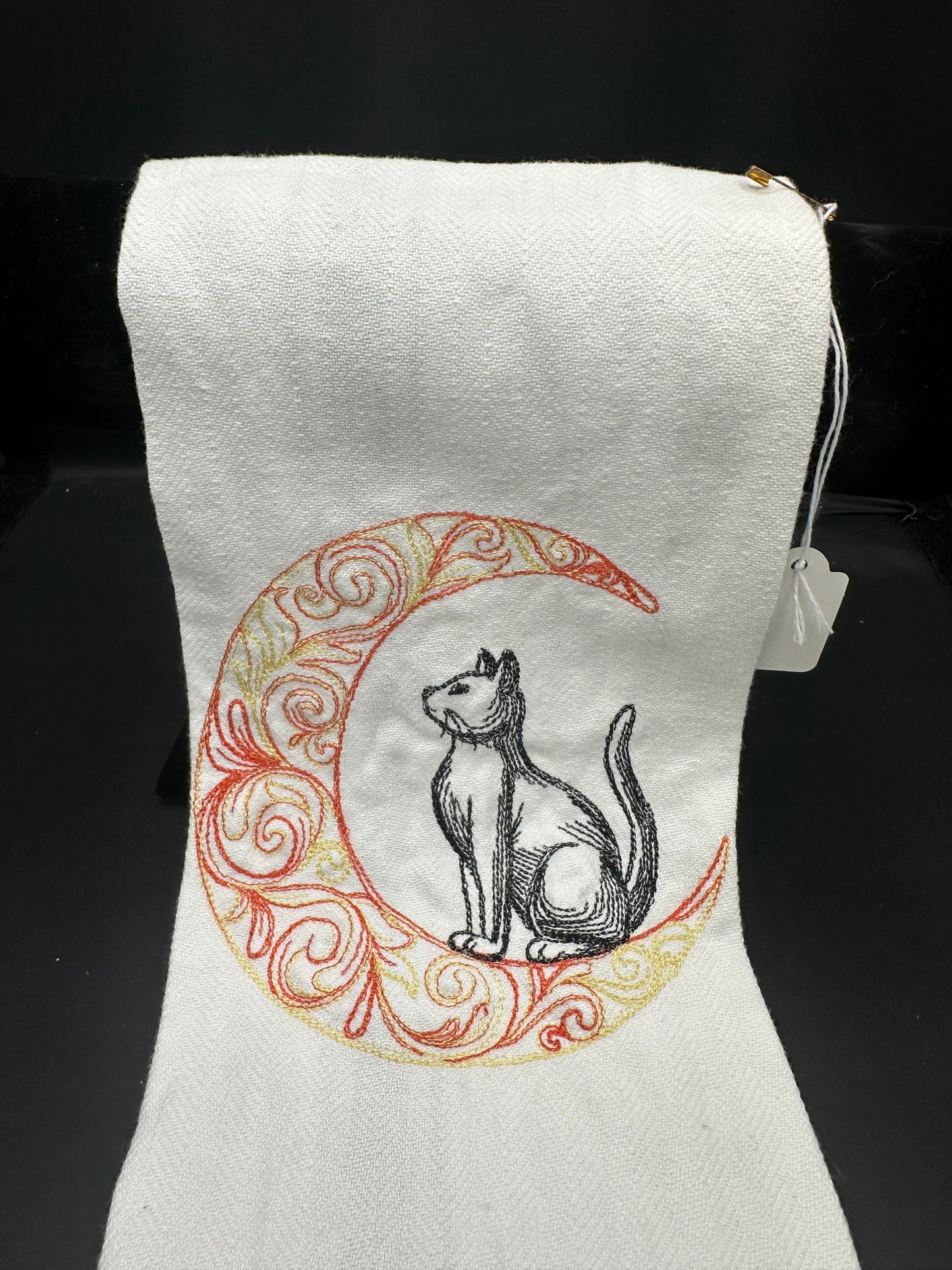 cat on moon towel