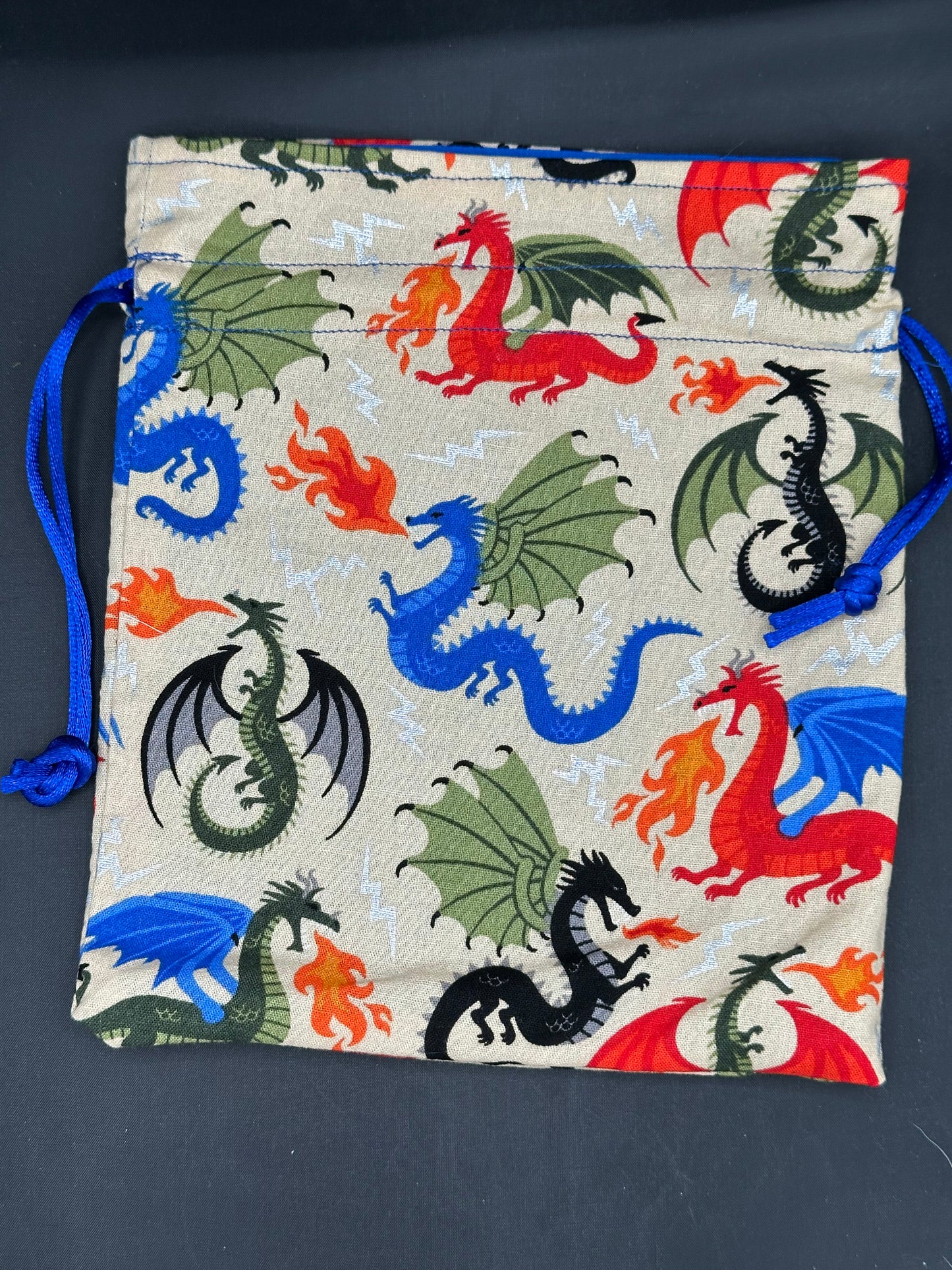 Colorful dragons on tan - drawstring