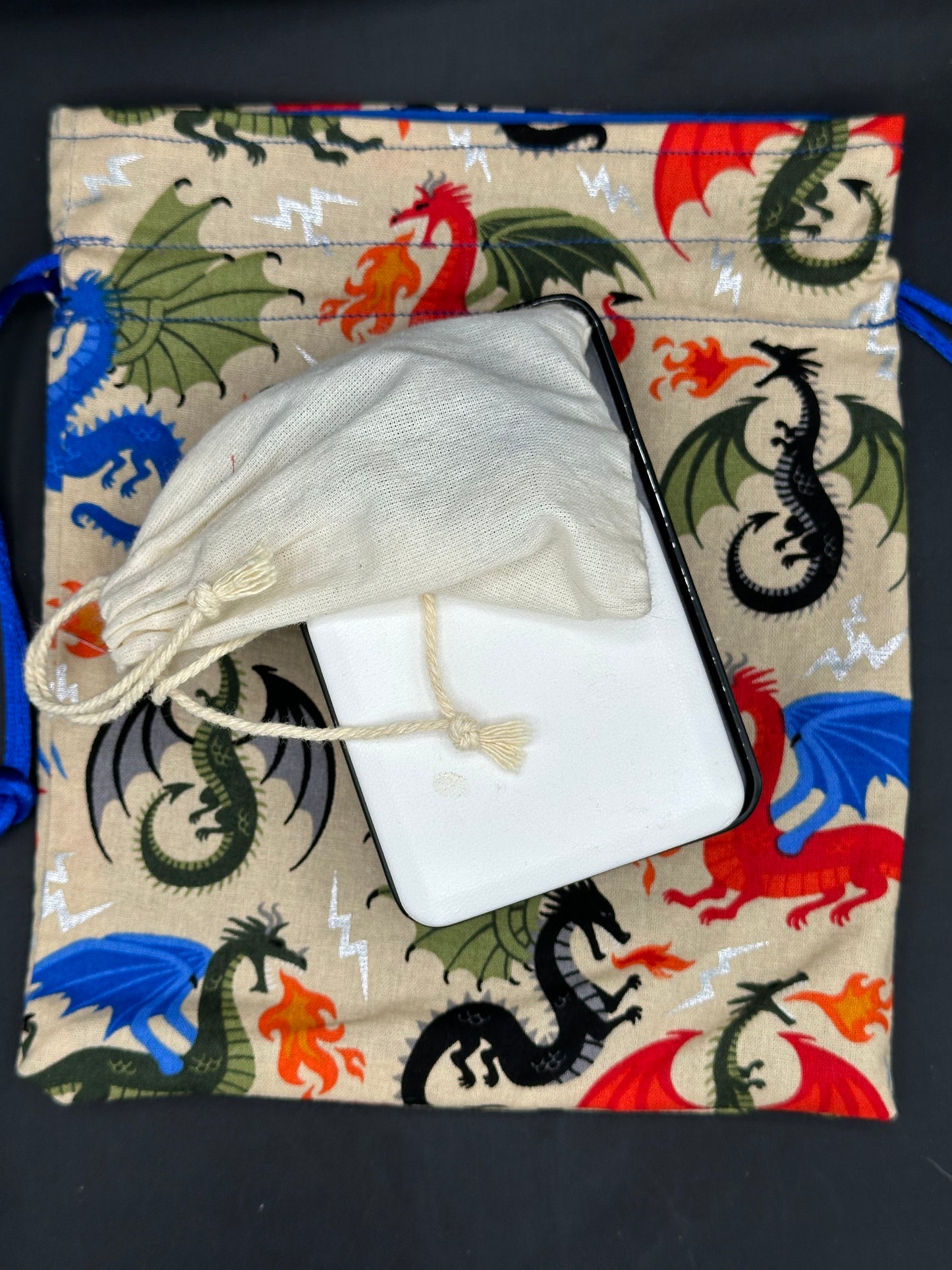 Colorful dragons on tan - drawstring