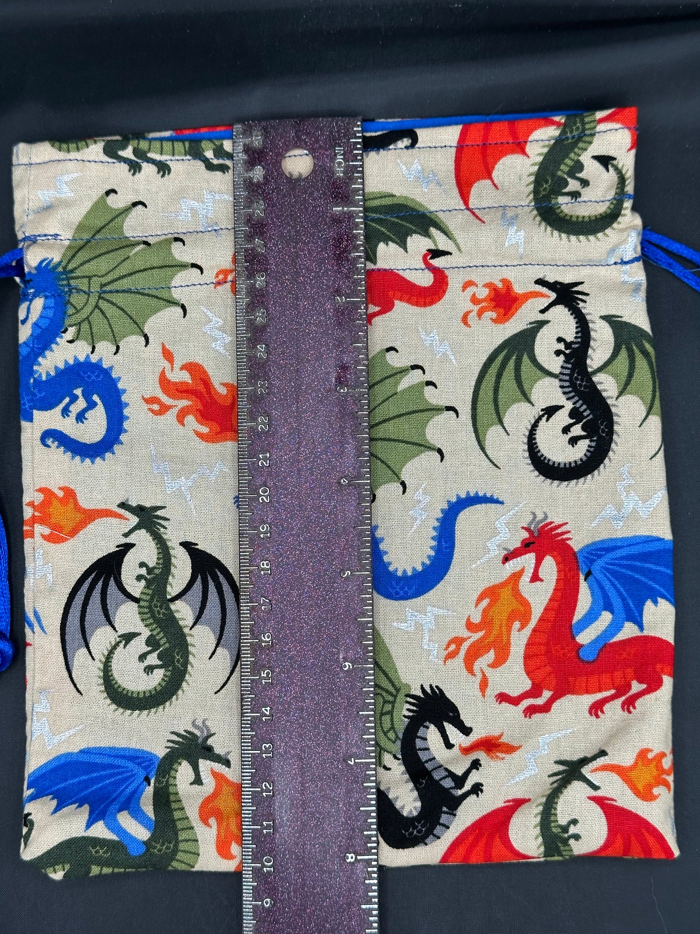 Colorful dragons on tan - drawstring