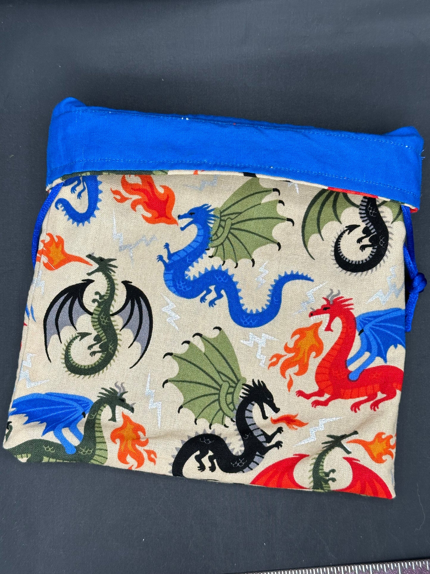 Colorful dragons on tan - drawstring