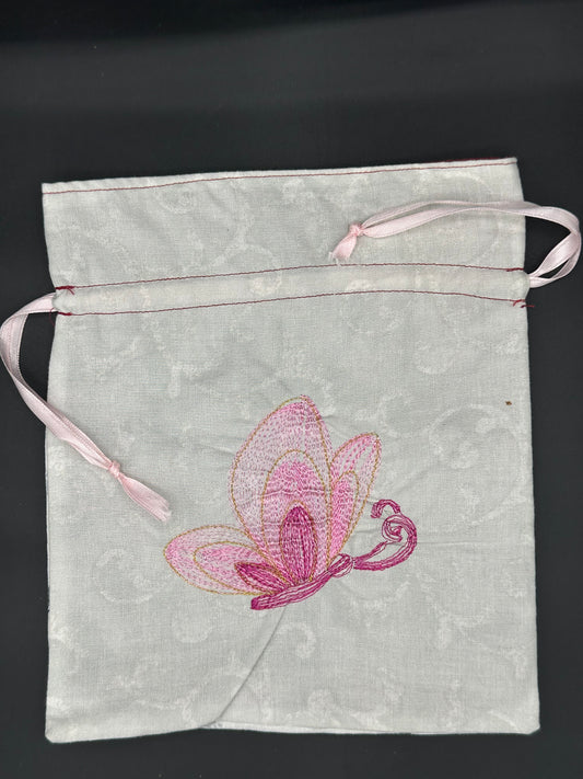 Embroidered butterfly draw string bag