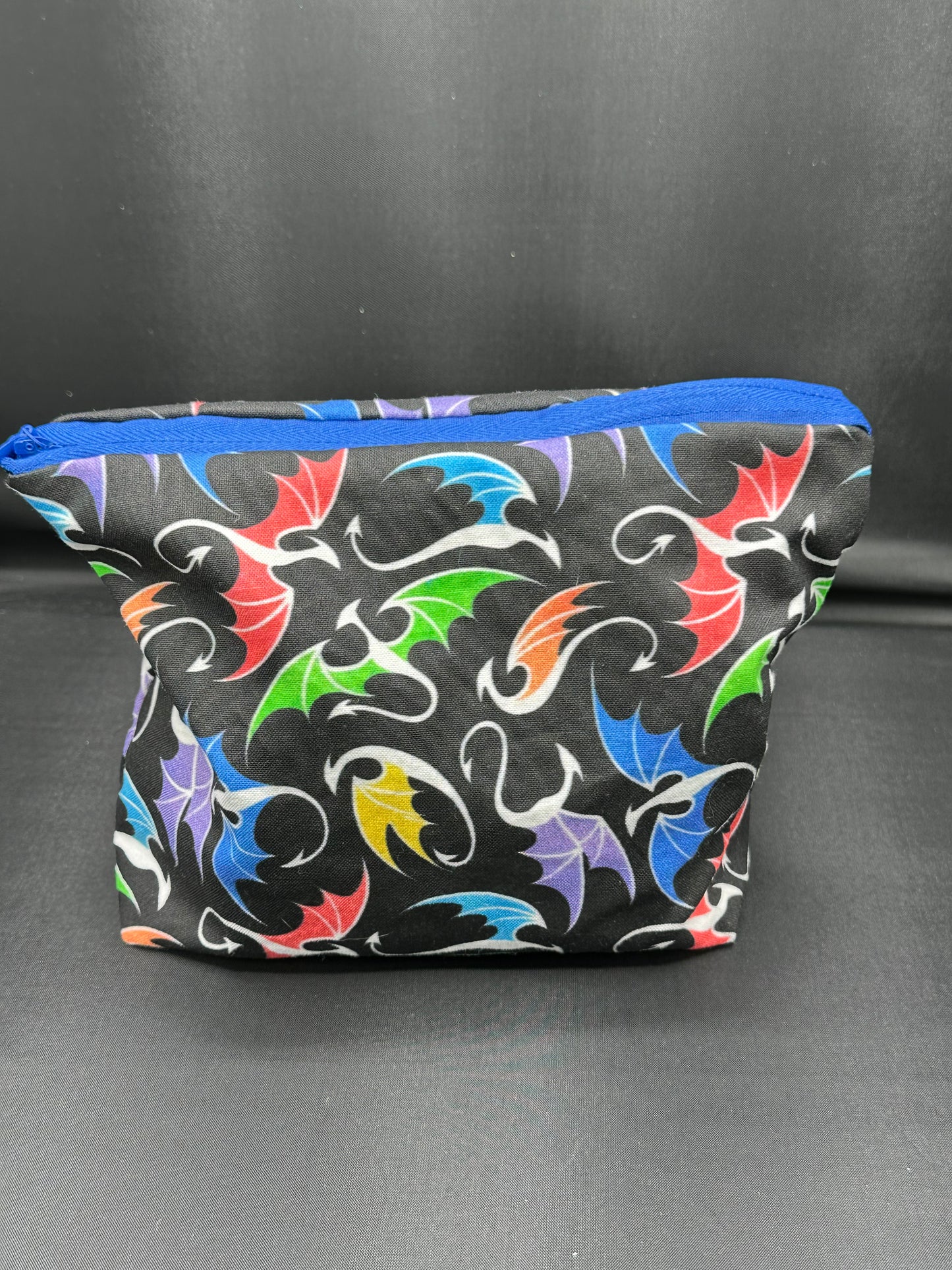 colorful dragons on black