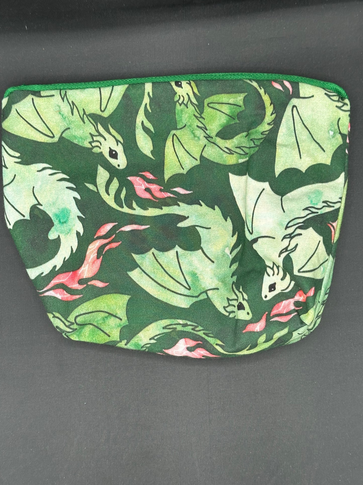 green dragons on dark green background