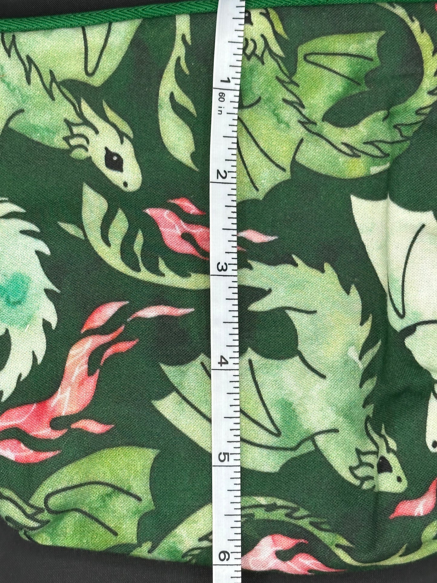 green dragons on dark green background