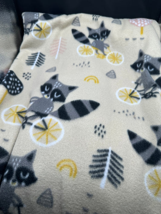 raccoons on bikes fleece blanket
