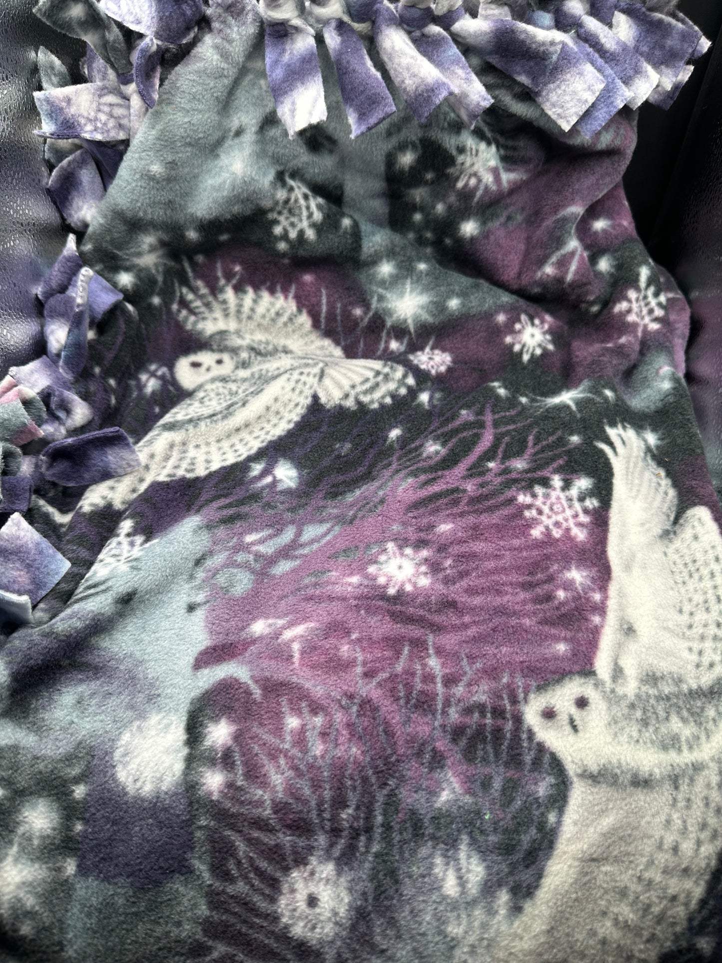 Snow owls on fleece blanket