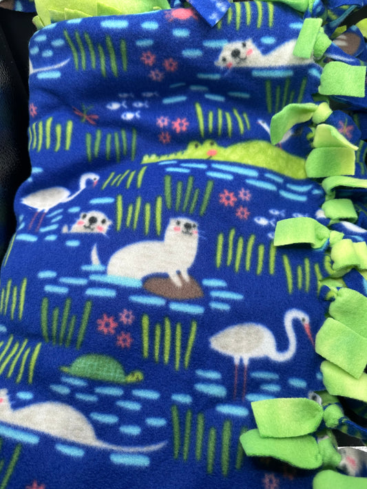 otters and alligators fleece blanket