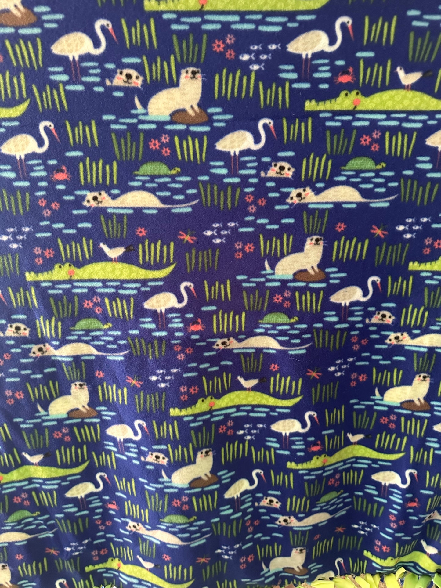otters and alligators fleece blanket