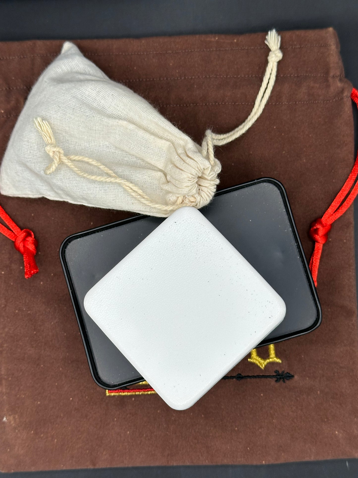 Embroidered My Lord on brown suede draw string bag