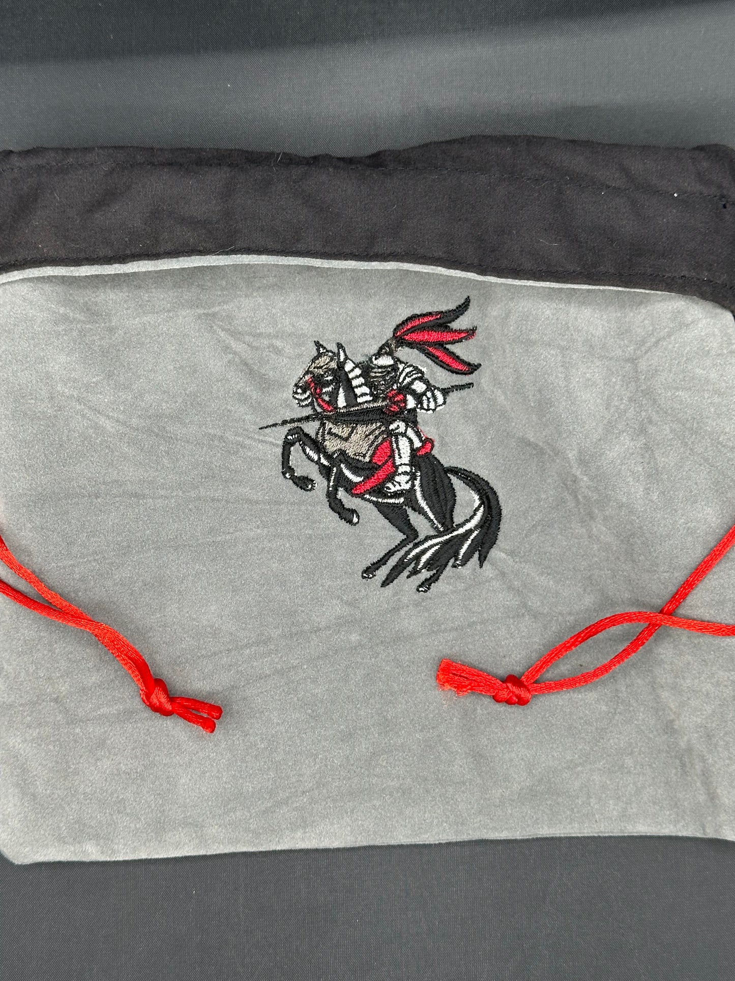 Embroidered Red Jousting Knight grey suede draw string bag