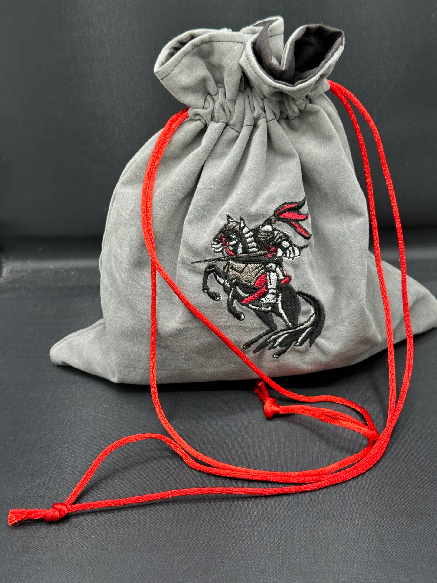 Embroidered Red Jousting Knight grey suede draw string bag