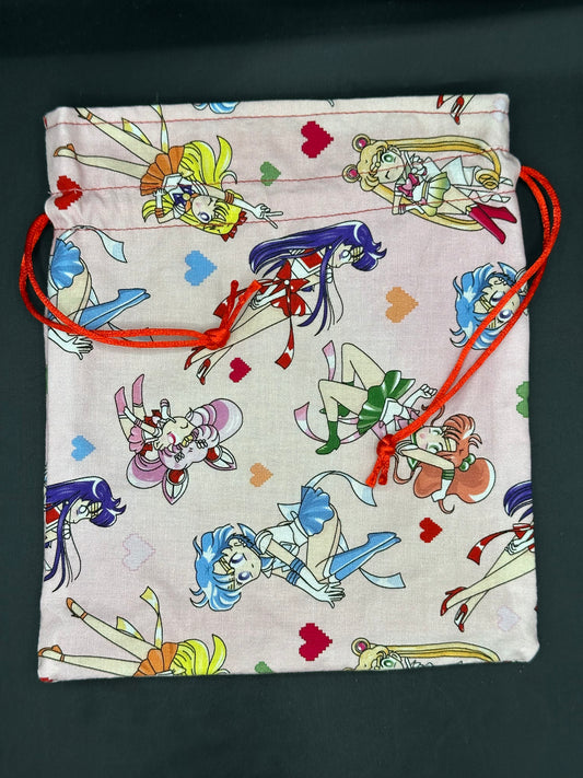 sailor moon on pink draw string bag