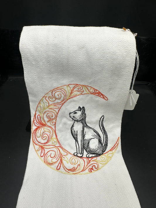 cat on moon towel